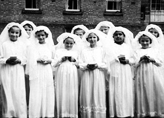 Photograph of a group of Nazareth House girls taken at their first Holy Communion c.1952. Photograph supplied by Pauline Wroe.