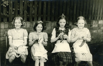 A group photograph taken at Lenton Church School in the late 1950s. Left to right: Mary Hodson, Marlene Dean, Jean Woolley and Ann Hart